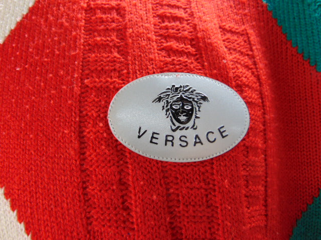 Trui: Versace, Jeans Couture