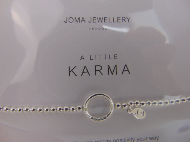Nieuwe Armband: A little Karma, Joma Jewellery, London