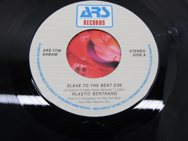 Single: Plastic, Slave To The Beat, 1989