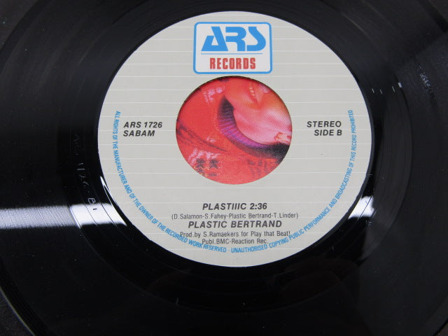 Single: Plastic, Slave To The Beat, 1989